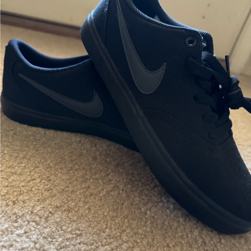 Nike Black Sneakers with Vulcanized Sole and Low-Top Design Never Worn